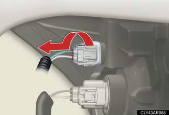 2. Turn the bulb base counterclockwise.