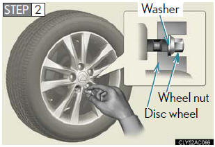 Install the spare tire and loosely