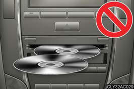 Do not insert more than one CD at a time.